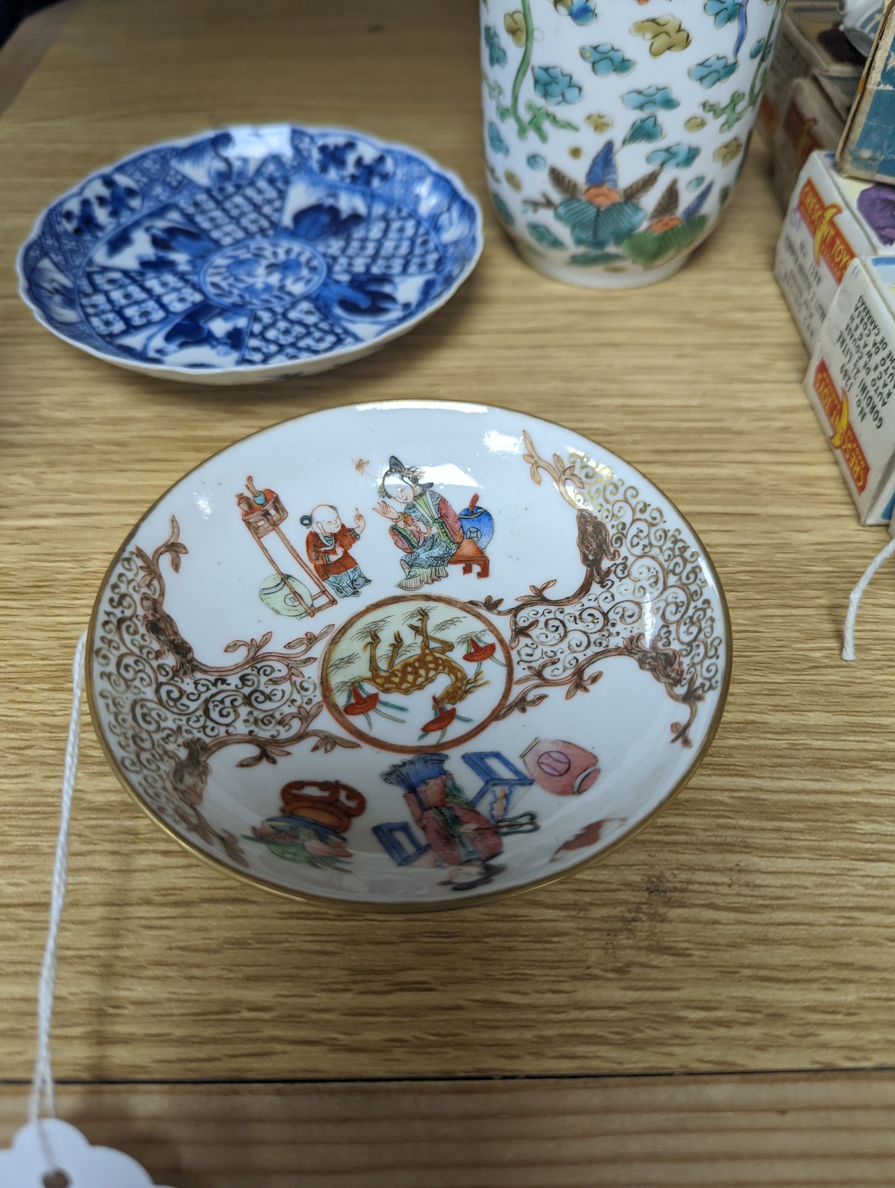 Two Chinese porcelain saucer dishes and an enamelled porcelain vase, 18th century and later, 12.5cm